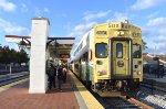 Sunrail Train # P331 about to pause at the Orlando Health / Amtrak Station heading southbound 